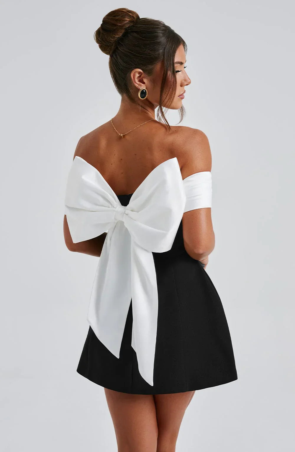 Jessica | Elegant Noir Mini Dress with Modern Bow Detail - Image 4