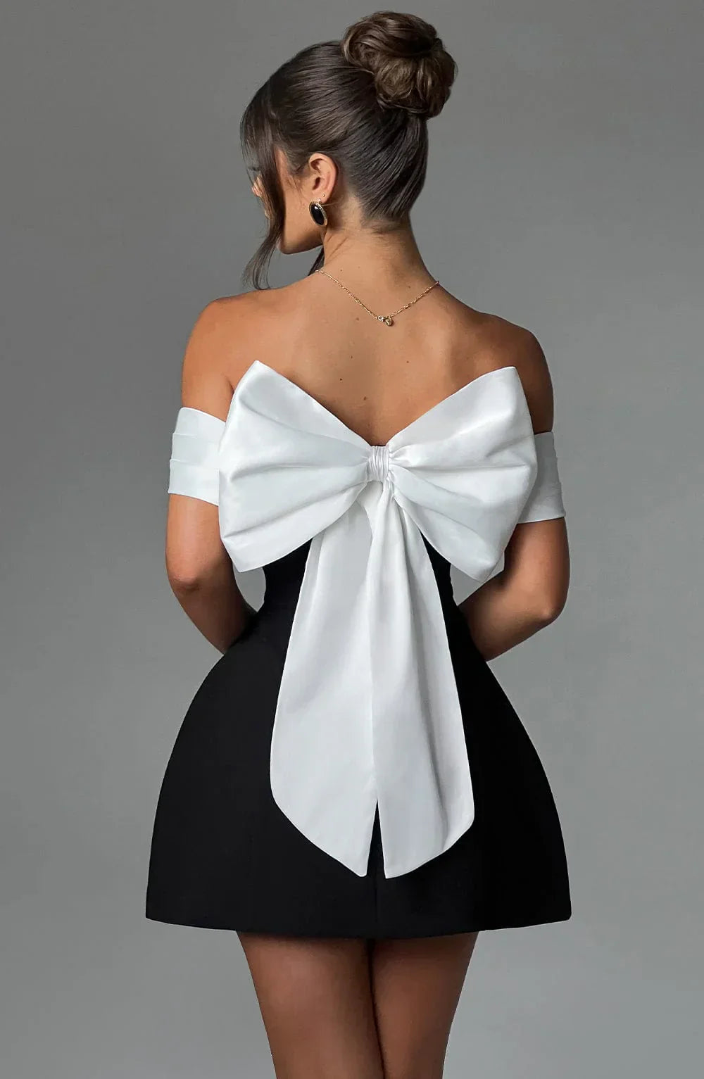Jessica | Elegant Noir Mini Dress with Modern Bow Detail - Image 10