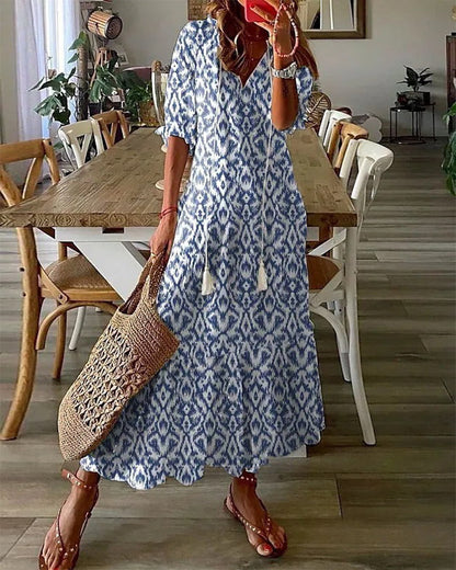 Image of Rochelle | Women's V-Neck A-Line Midi Dress